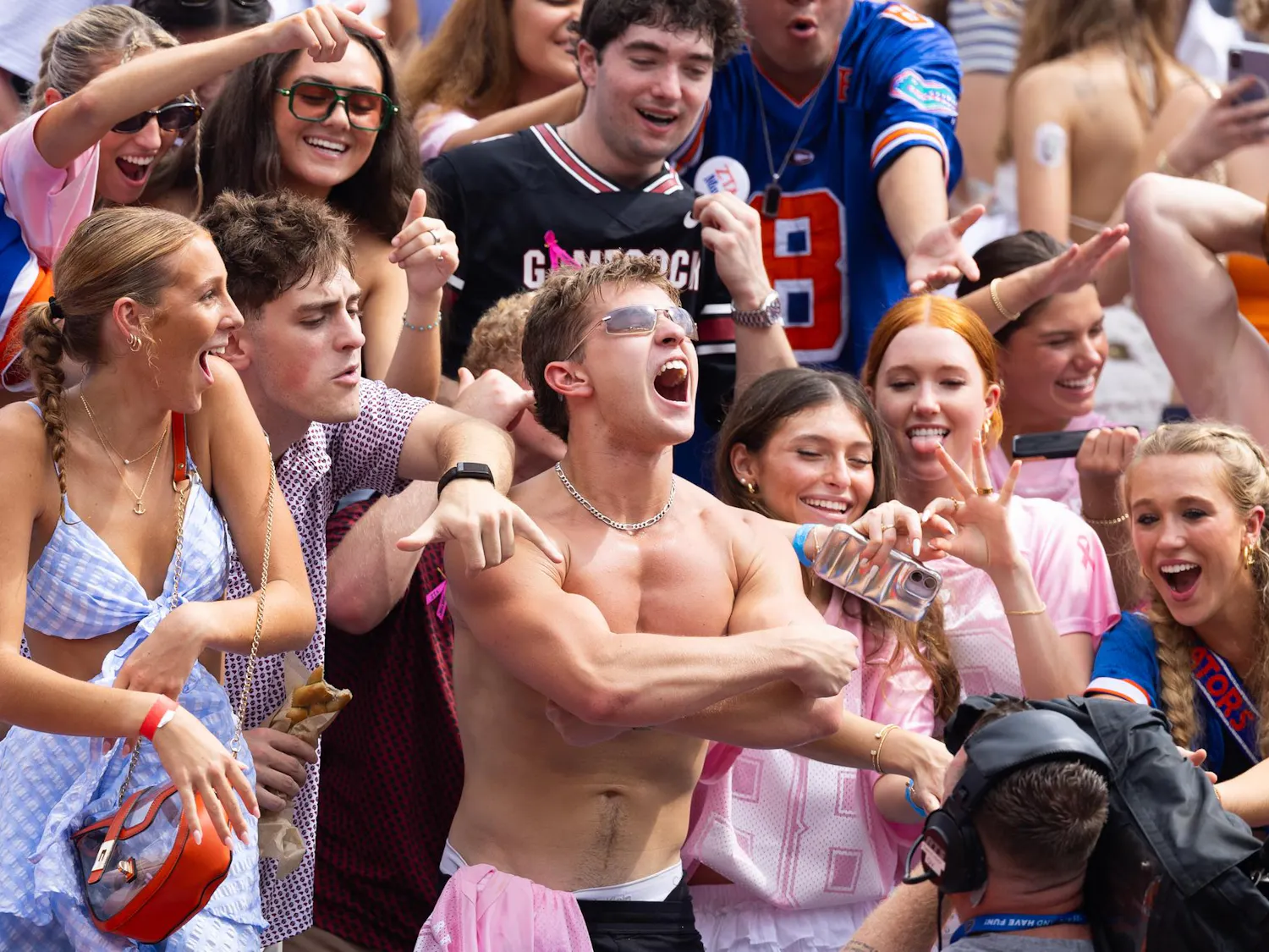 An attendant of the Florida versus South Carolina NCAA football game flexes during the first half, Saturday, Oct. 10, 2026, in Gainesville, Fla.