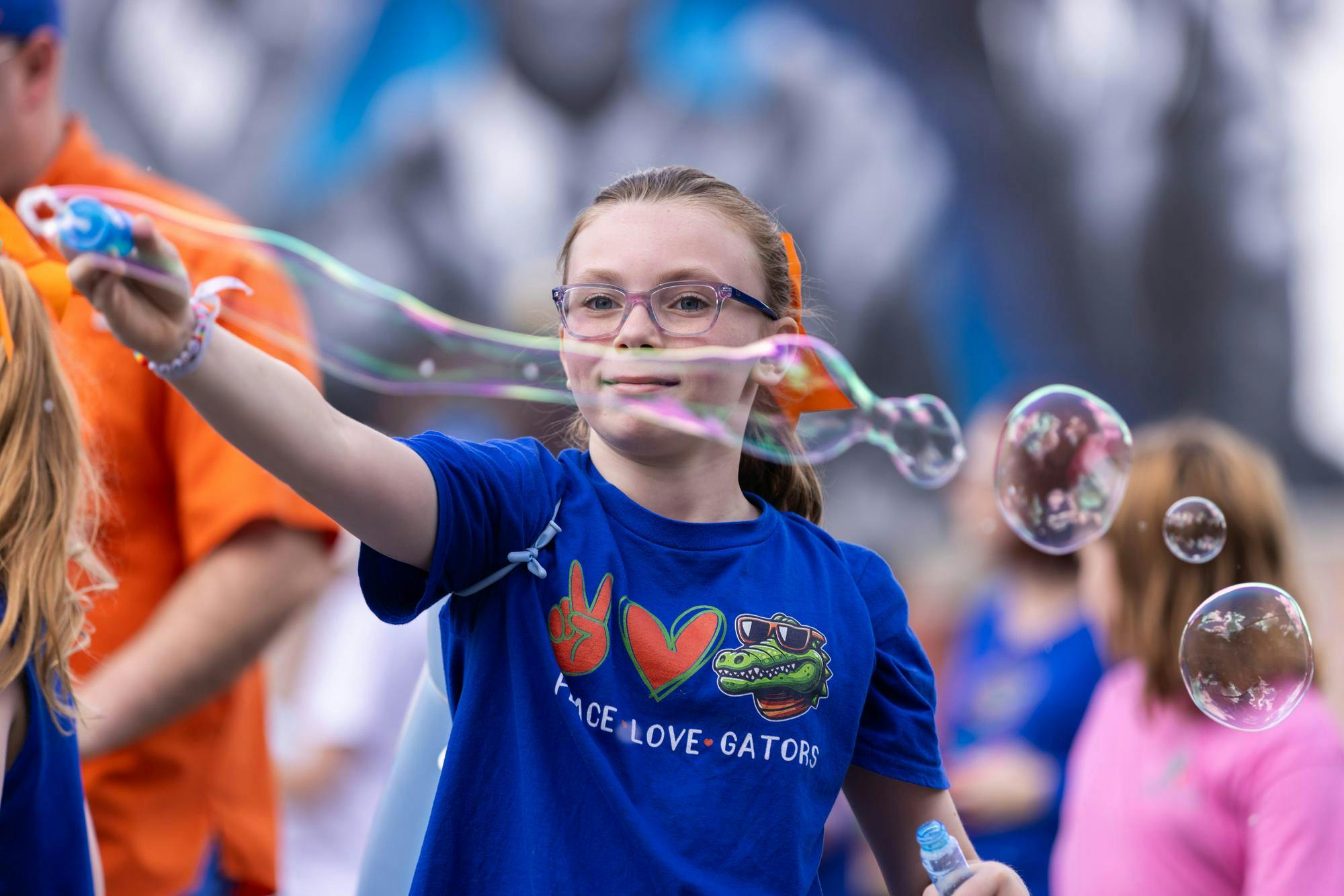 Parade floats travel across University Avenue during the Homecoming Parade in Gainesville on Friday, Oct. 17, 2025.