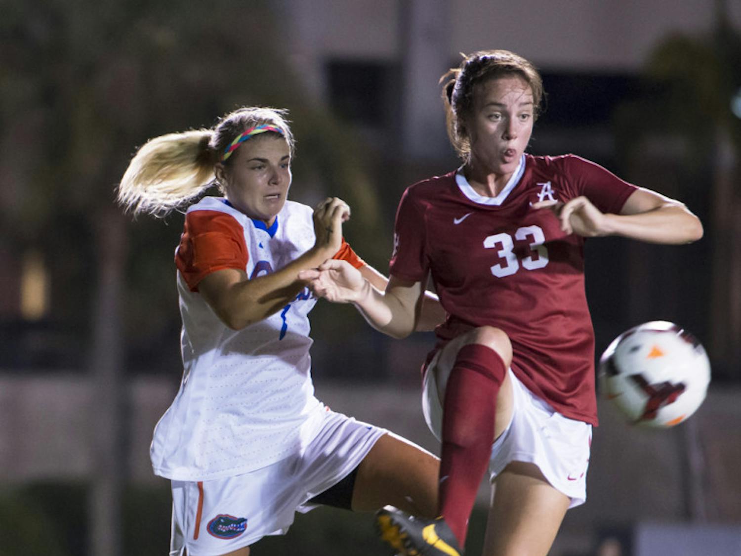 Savannah Jordan (left) battles for the ball during Florida’s 3-0 victory against Alabama on Sept. 20.