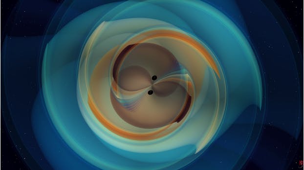 A still image from a simulation of two black holes that inspiral and merge.