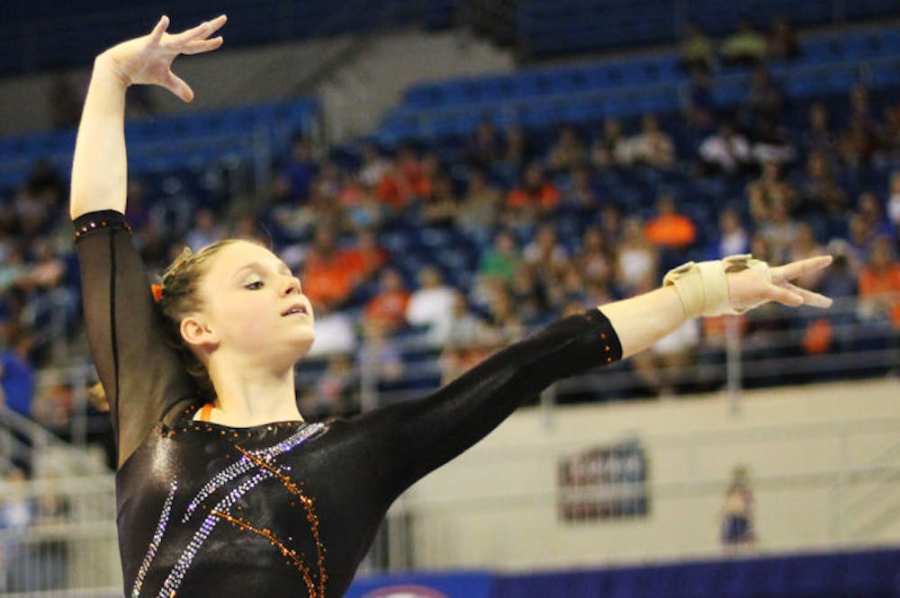<p align="justify">Florida all-around gymnast Bridgette Caquatto performs her floor routine where she scored a 9.650 during Florida’s win against Kentucky on Friday in the O’Connell Center.</p>