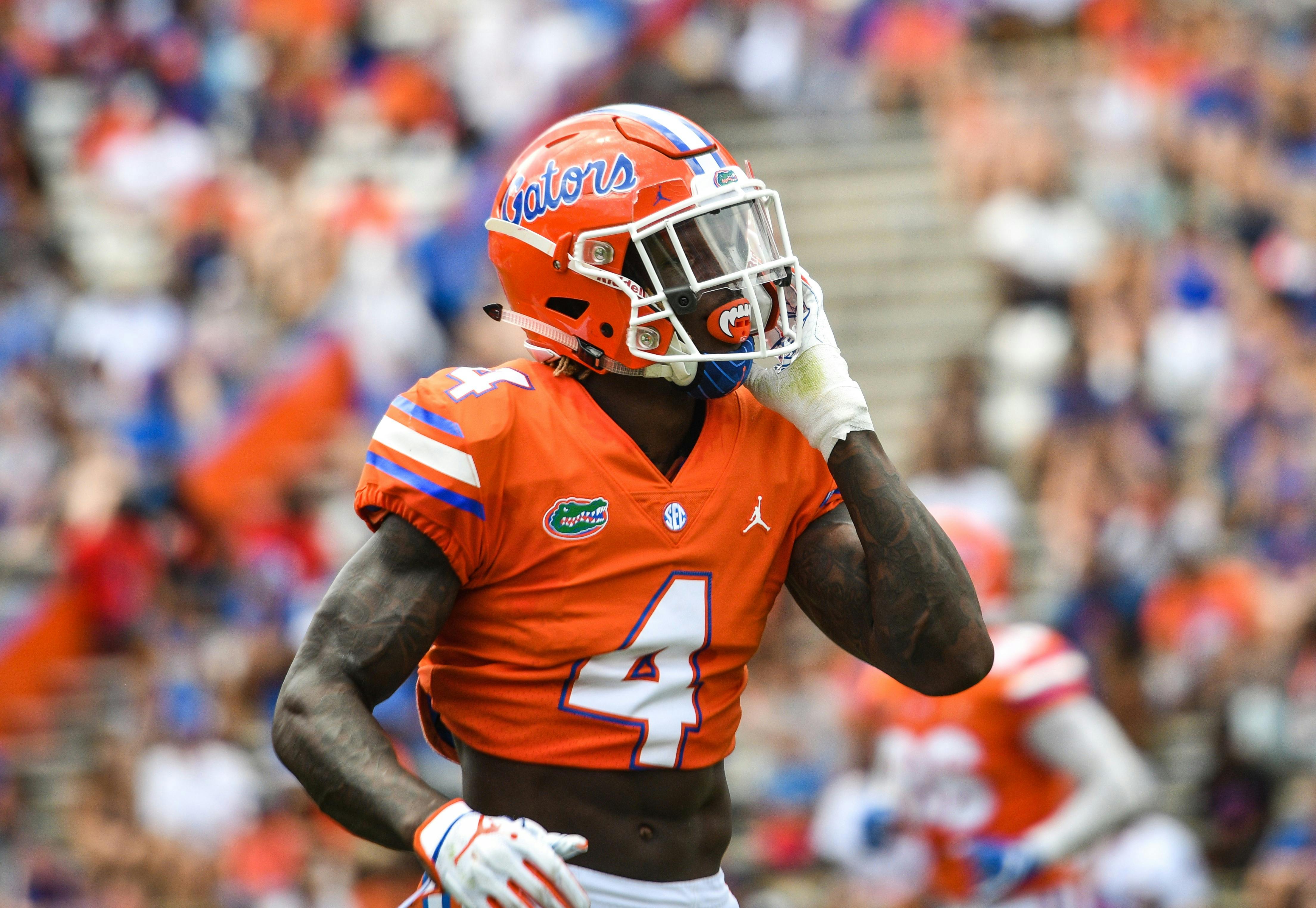 The first play of the Gators' Orange and Blue game Saturday was a double-reverse pass from receiver Kadarius Toney (pictured) to quarterback Feleipe Franks for a 40-yard gain. 