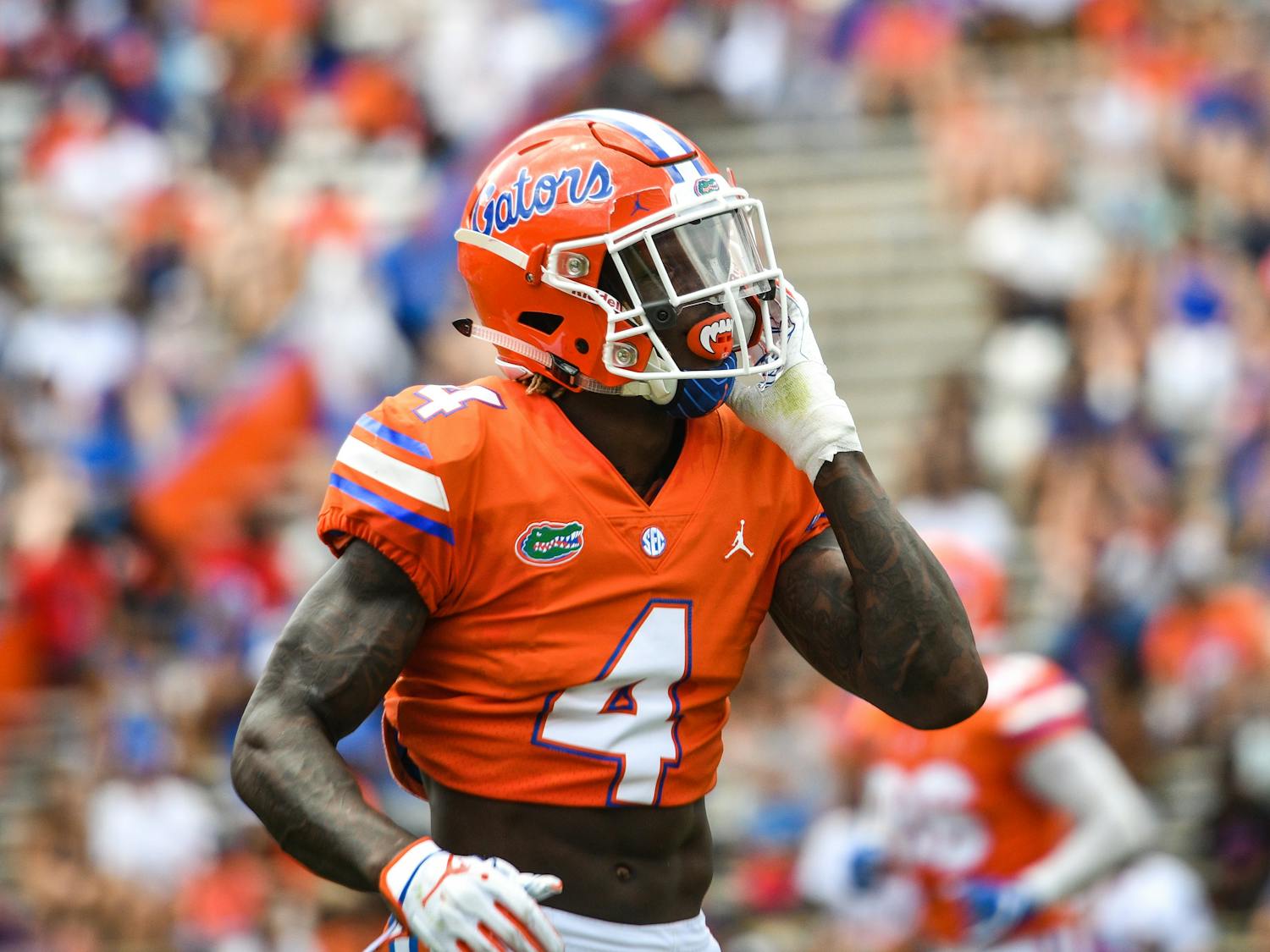The first play of the Gators' Orange and Blue game Saturday was a double-reverse pass from receiver Kadarius Toney (pictured) to quarterback Feleipe Franks for a 40-yard gain. 