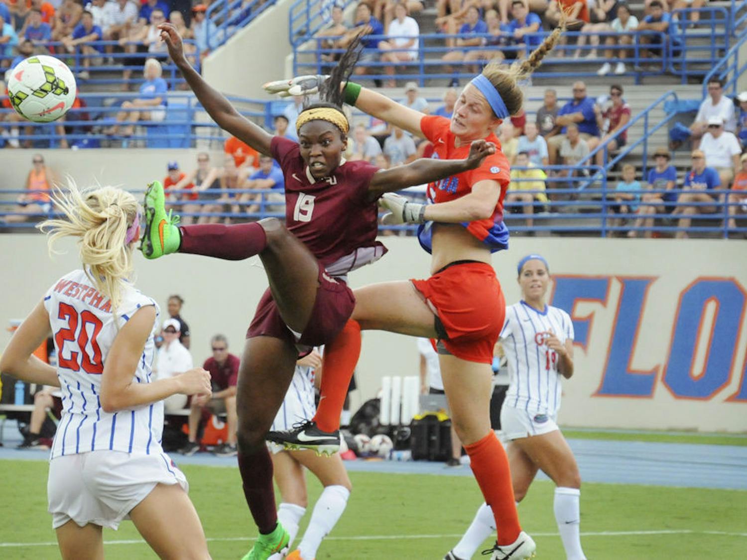 UF goalkeeper Val Tysinger (right) battles for possession with FSU forward Cheyna Williams (19) during Florida's 3-2 win on Aug. 30, 2015, at James G. Pressly Stadium.