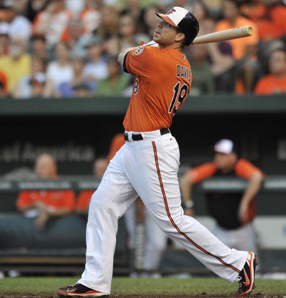 Baltimore’s Chris Davis follows through on a three-run home run against the New York Yankees on June 29 in Baltimore. Davis is the American League’s starting first baseman.