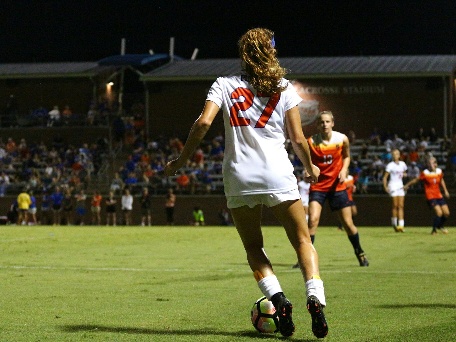 Mayra Pelayo runs with the ball during Florida's 2-1 win against Syracuse on August 27, 2017, at Donald R. Dizney Stadium.