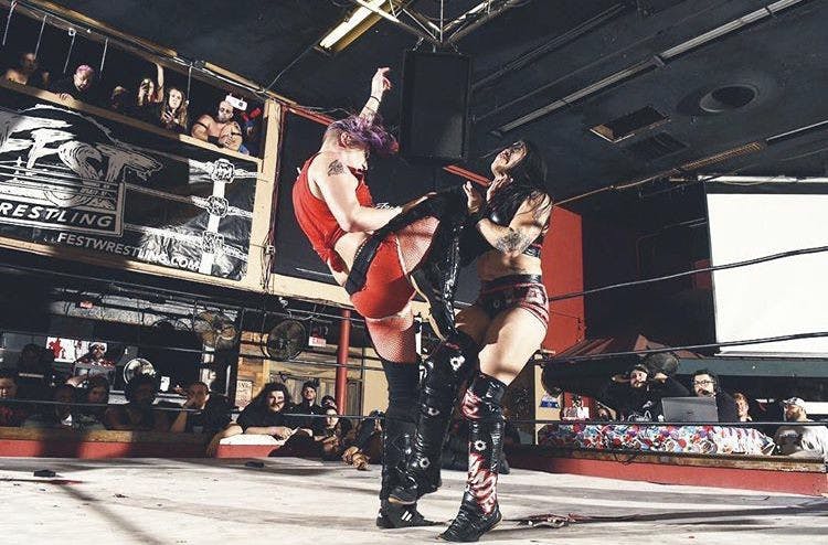 Jamie Senegal (left) wrestling in a FEST Wrestling event in December.