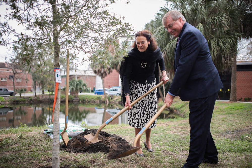 <p><span id="docs-internal-guid-ee85c357-7fff-3129-ecff-a662cf4e31b6"><span>UF President Kent Fuchs and Wageningen University and Research Executive Board President Louise Fresco planted a 9-foot live oak tree Thursday for Florida Arbor Day. This is part of an initiative to plant 100 “UniversiTREEs” across the world.</span></span></p>