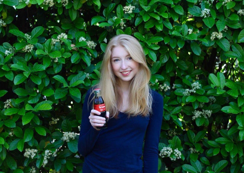 Briana Berger, an 18-year-old F.W. Buchholz High School senior, is one of 150 students who won a $20,000 scholarship from the Coca-Cola Scholars Foundation. More than 90,000 students applied.