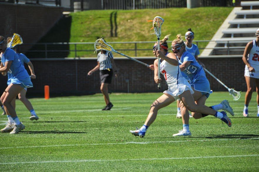 UF attacker Shayna Pirreca runs with the ball during Florida's 13-10 loss to North Carolina on Feb. 11, 2017, at Donald R. Dizney Stadium.&nbsp;