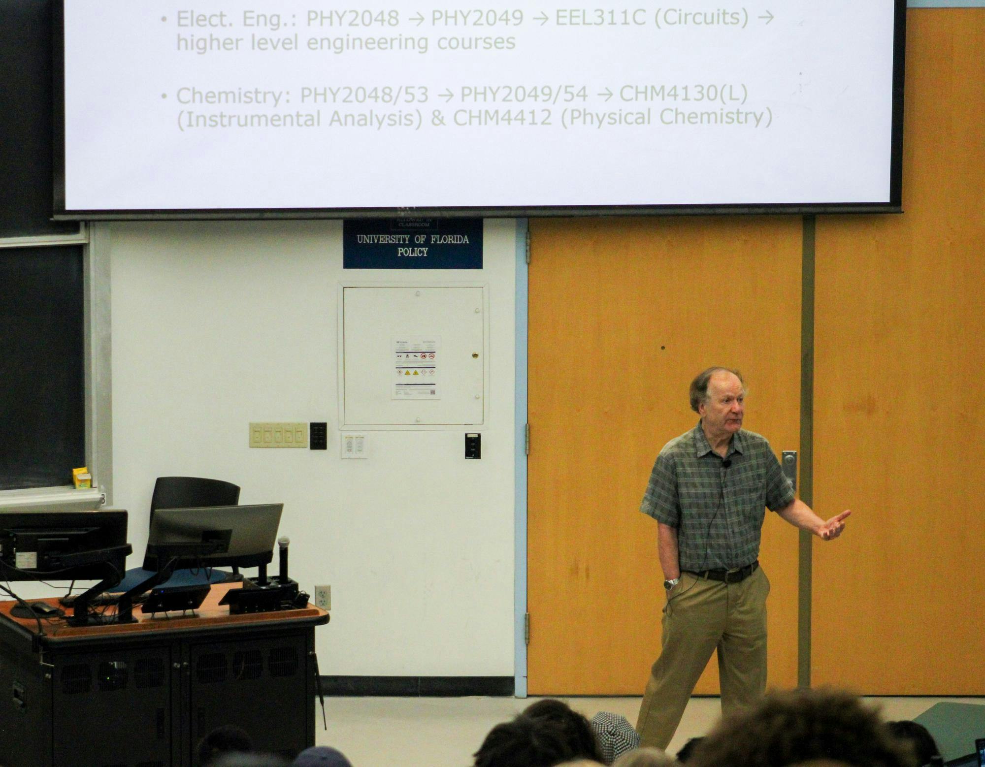 Professor John Yelton talks to students at the New Physics Building, Friday, August 21, 2026, in Gainesville, Fla.