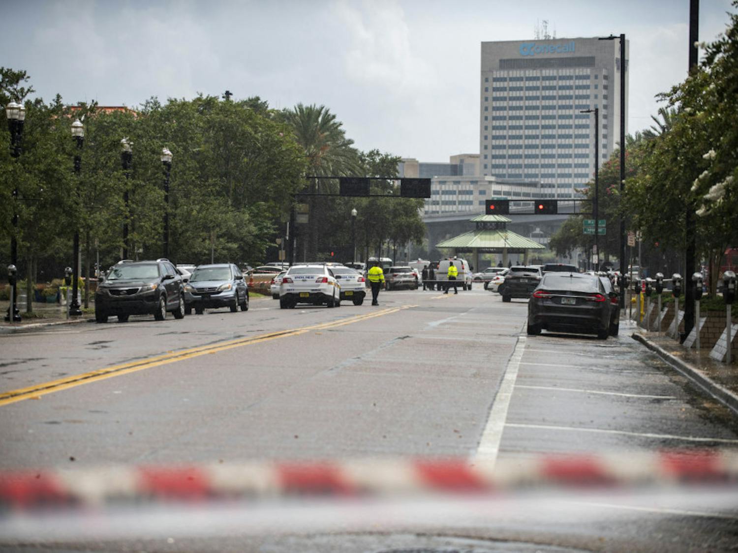 Police barricade a street near the Jacksonville Landing in Jacksonville, Fla., Sunday, Aug. 26, 2018. Florida authorities are reporting multiple fatalities after a mass shooting at the riverfront mall in Jacksonville that was hosting a video game tournament. (AP Photo/Laura Heald)