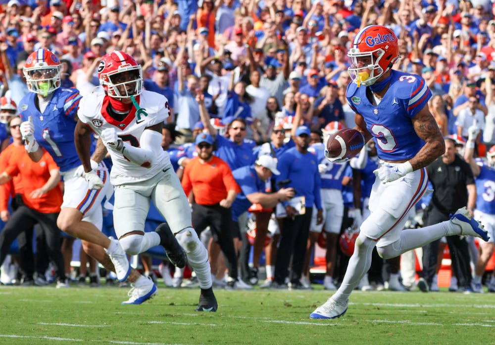 Freshman wide receiver Eugene Wilson III runs the ball for the touchdown in the Gators' 43-20 loss to the Georgia Bulldogs on Saturday, Oct. 28, 2023.