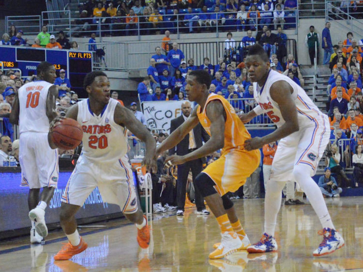 Michael Frazier II drives the ball down the court during Florida’s 67-41 win against Tennessee on Saturday in the O’Connell Center. Frazier led the Gators with 17 points against the Volunteers.
