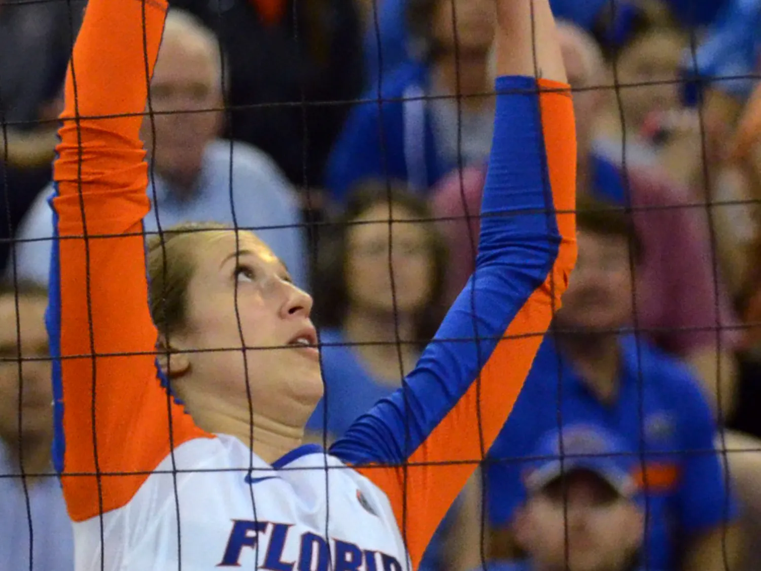 Mackenzie Dagostino sets the ball during No. 8 seed Florida's 3-1 win against Miami in the second round of the NCAA Tournament on Dec. 6, 2014, in the O'Connell Center.