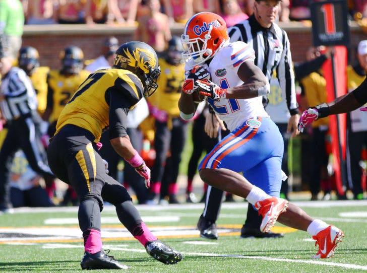 Kelvin Taylor runs the football during Florida’s 36-17 loss to Missouri on Oct. 19 at Faurot Field in Columbia, Mo. The freshman running back, who scored the first touchdown of his college career against the Tigers, is expected to make his first start against Georgia on Saturday in Jacksonville.