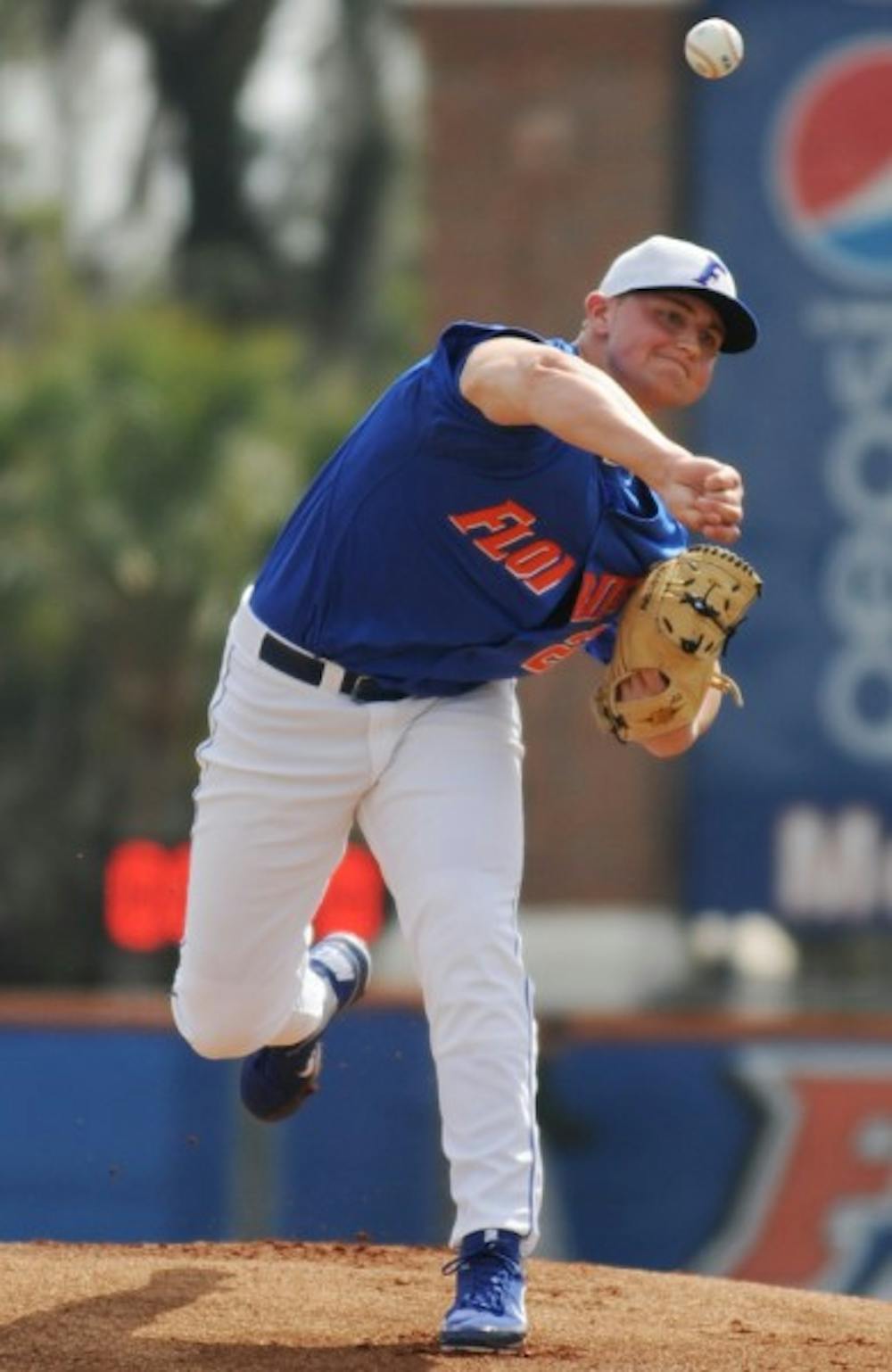 <p>Karsten Whitson pitches during UF’s 5-0 win against USF on Feb. 20, 2011. Whitson missed the entire 2013 season after undergoing shoulder surgery in February 2013.</p>