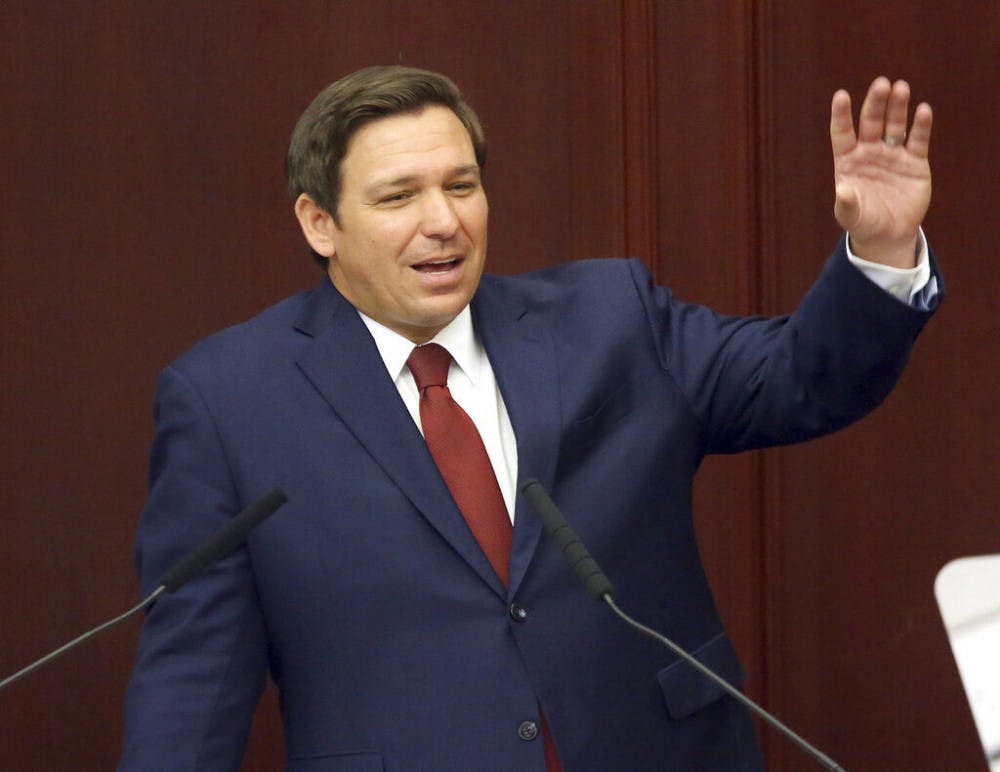 <p>FILE- In this March 5, 2019 file photo, Florida Gov. Ron Desantis gives his state of the state address on the first day of the legislative session in Tallahassee, Fla. De Santis has pushed for a repeal to Florida's ban on smokable medical marijuana. The Senate passed a bill Thursday, March 7, 2019, that repeals the ban, and now the House takes up that legislation Wednesday. It's the first major action by lawmakers this year, largely because DeSantis gave them a mid-March deadline to get it done. (AP Photo/Steve Cannon, File)</p>
