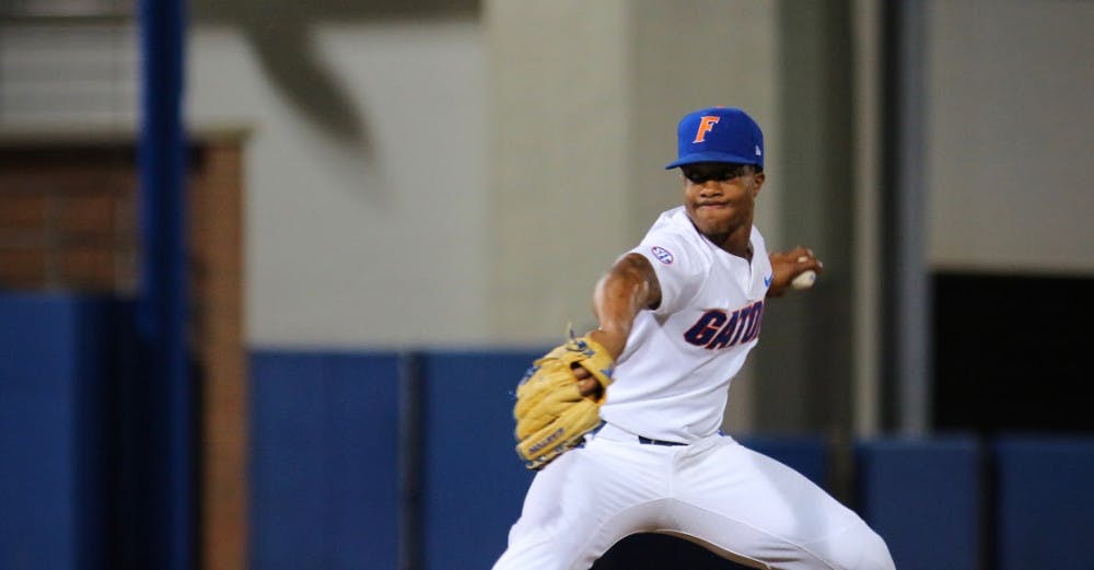 <p>UF reliever Andrew Baker throws a pitch during Florida's 1-0 win against LSU on Friday at McKethan Stadium.</p>