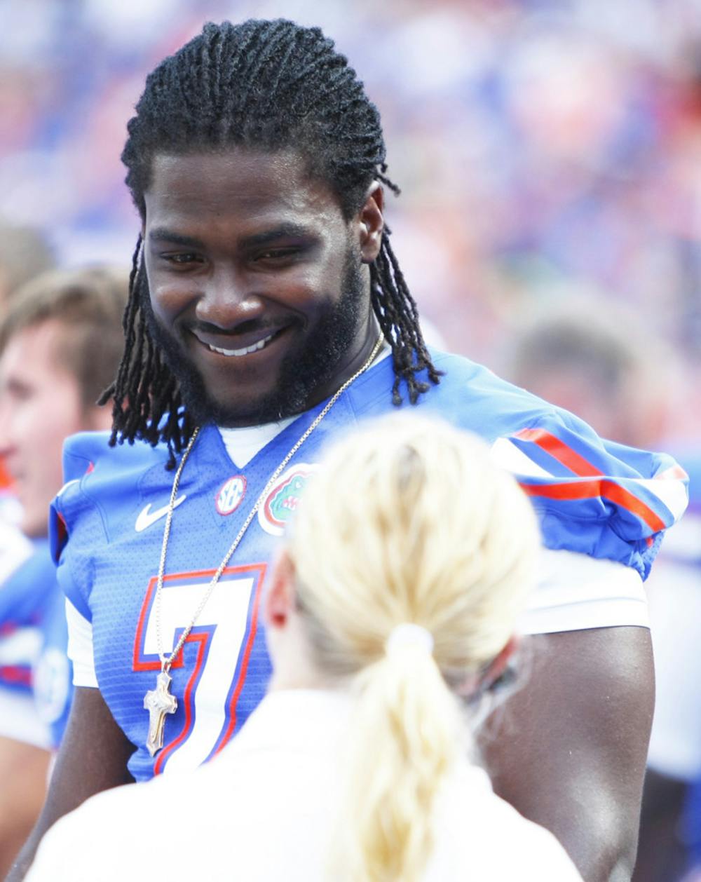 <p>Junior Ronald Powell chats on the sideline during the Bowling Green University game Sept. 1 at Ben Hill Griffin Stadium. Powell aggravated a torn ACL and will likely take a medical redshirt, coach Will Muschamp announced Monday.</p>