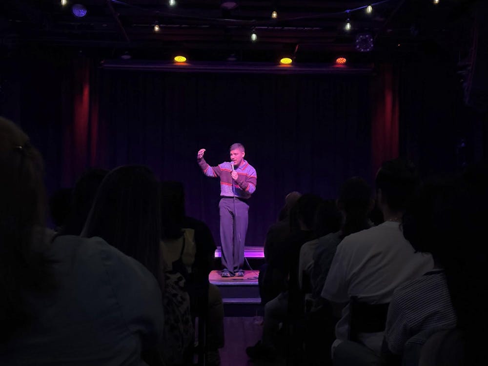 Comedian Angelo Molina performs on stage at The Wooly March 6, 2026 in Gainesville, Fla.