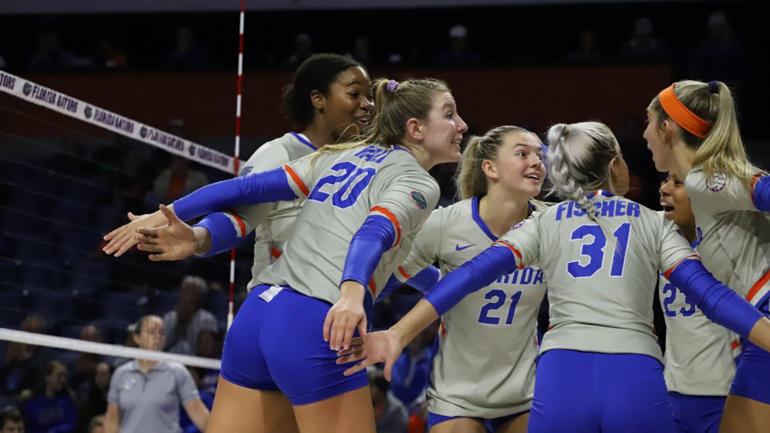 UF volleyball huddles in a game against LSU in 2019. The Gators unveiled their 2021 schedule Thursday.