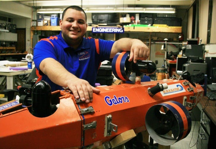 Computer science senior Camilo Buscaron, 22, spends his days working with robots to prepare them for competitions. He and his team recently built the SubjuGator, which can to swim through underwater tubes without a remote control.