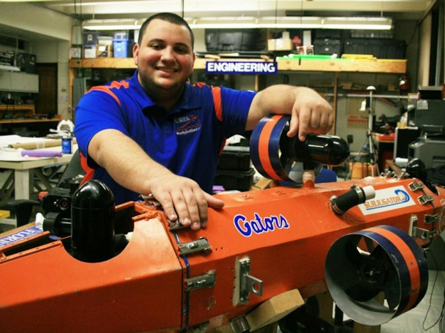 Computer science senior Camilo Buscaron, 22, spends his days working with robots to prepare them for competitions. He and his team recently built the SubjuGator, which can to swim through underwater tubes without a remote control.