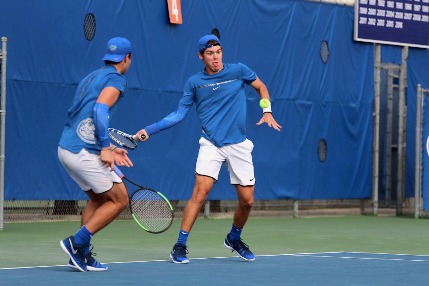 Florida’s No. 1 doubles pair — Duarte Vale (left) and McClain Kessler (right) — helped lead UF to a 4-2 win over No. 13 Michigan on Friday.