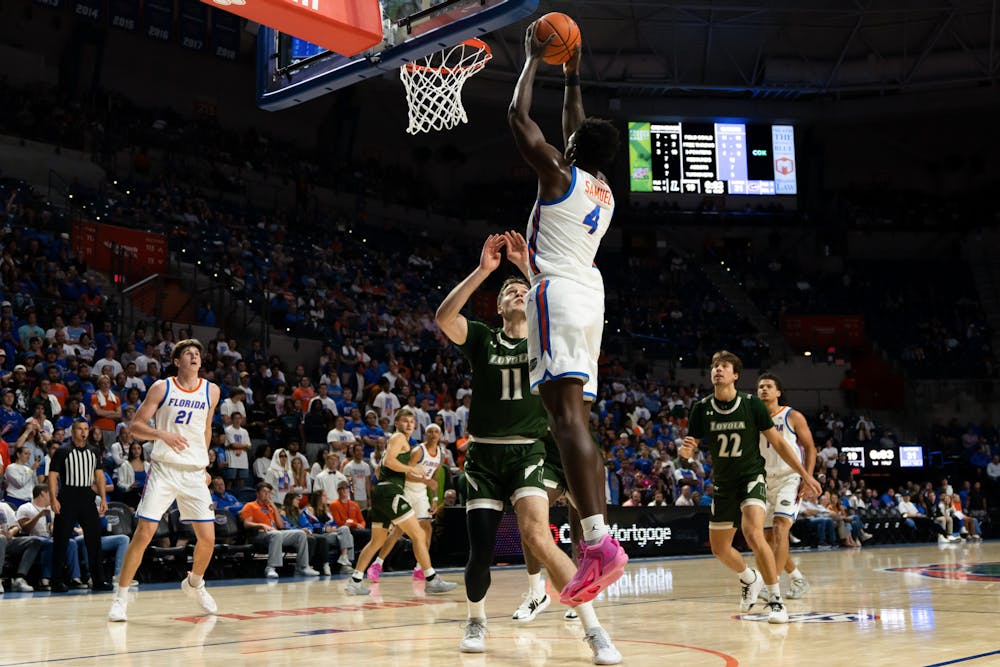 Graduate student Tyrese Samuel rises up for a dunk in the Gators' 93-73 win against Loyola Maryland on Monday, Nov. 6, 2023.