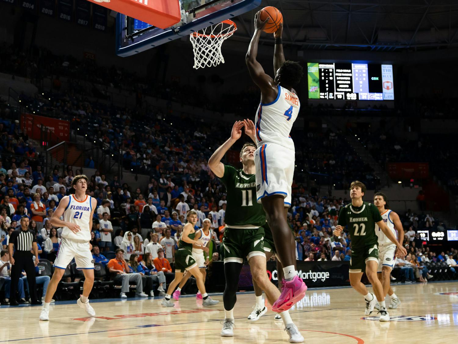 Graduate student Tyrese Samuel rises up for a dunk in the Gators' 93-73 win against Loyola Maryland on Monday, Nov. 6, 2023.