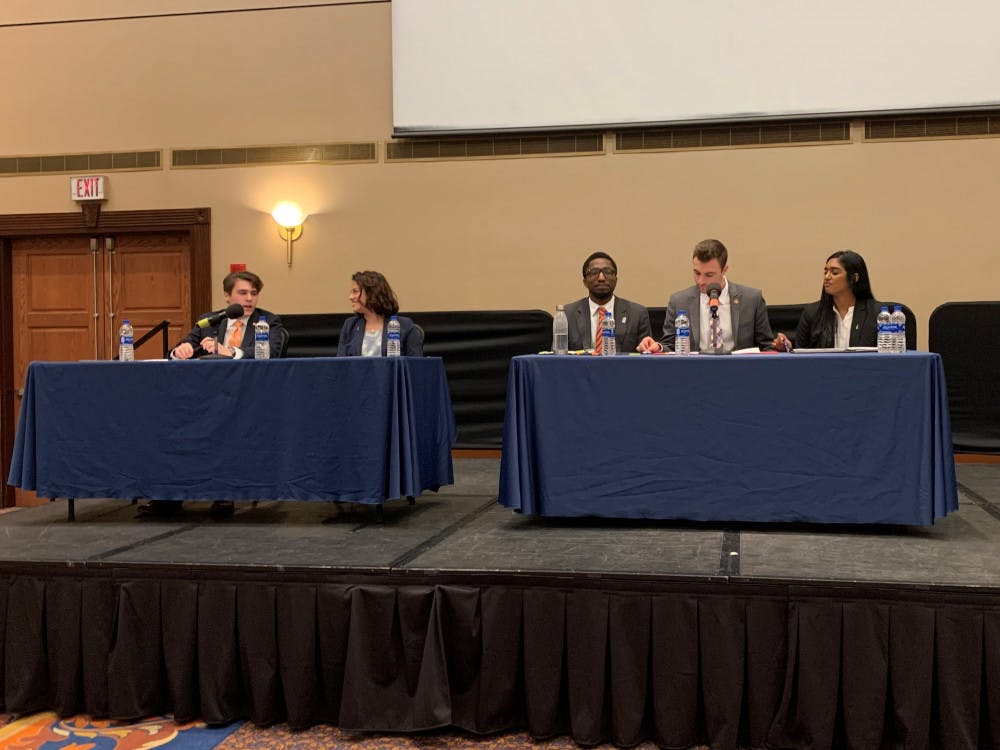 <p>Inspire (left) and Gator Party (right) executive candidates argued in their first Student Government debate.</p>