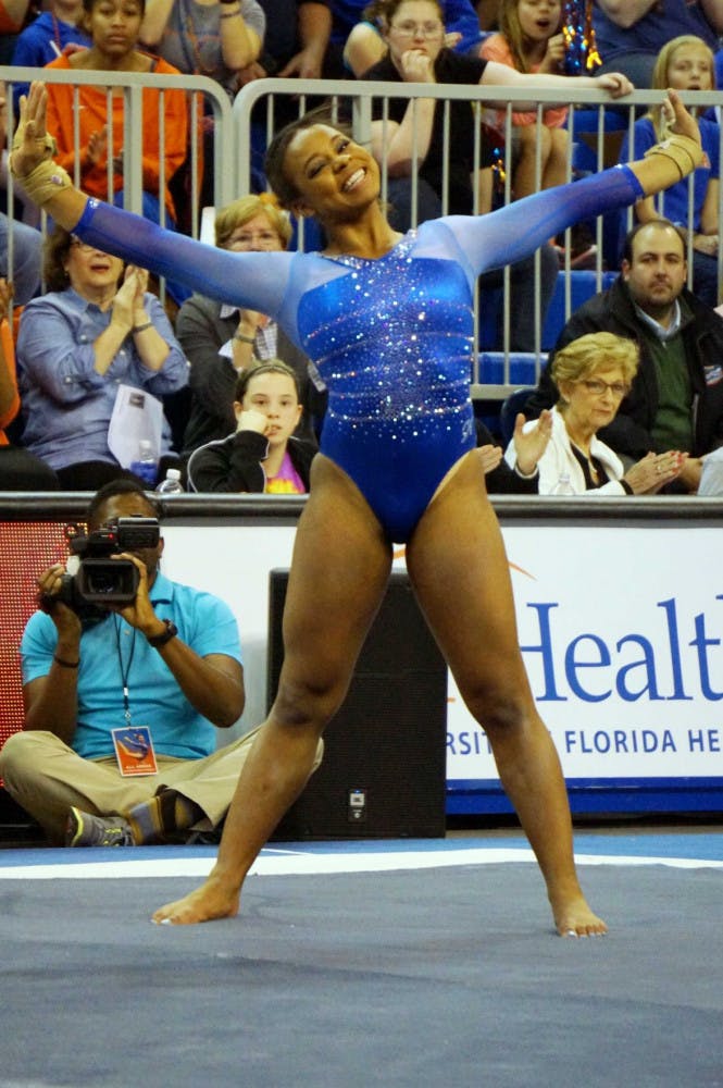 Kennedy Baker performs her floor exercise during Florida's 197.60-196.950 win against Georgia on Friday in the O'Connell Center.