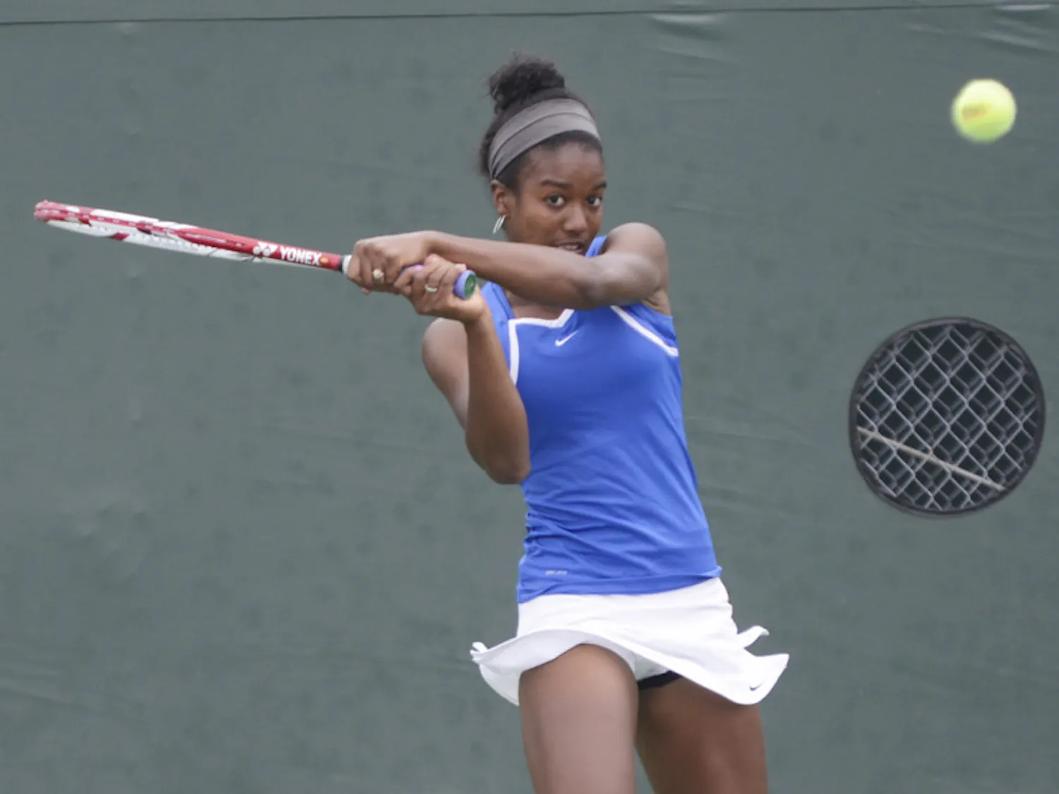 Freshman Brianna Morgan hits a backhand to return a ball during a match against Tennessee on March 17.