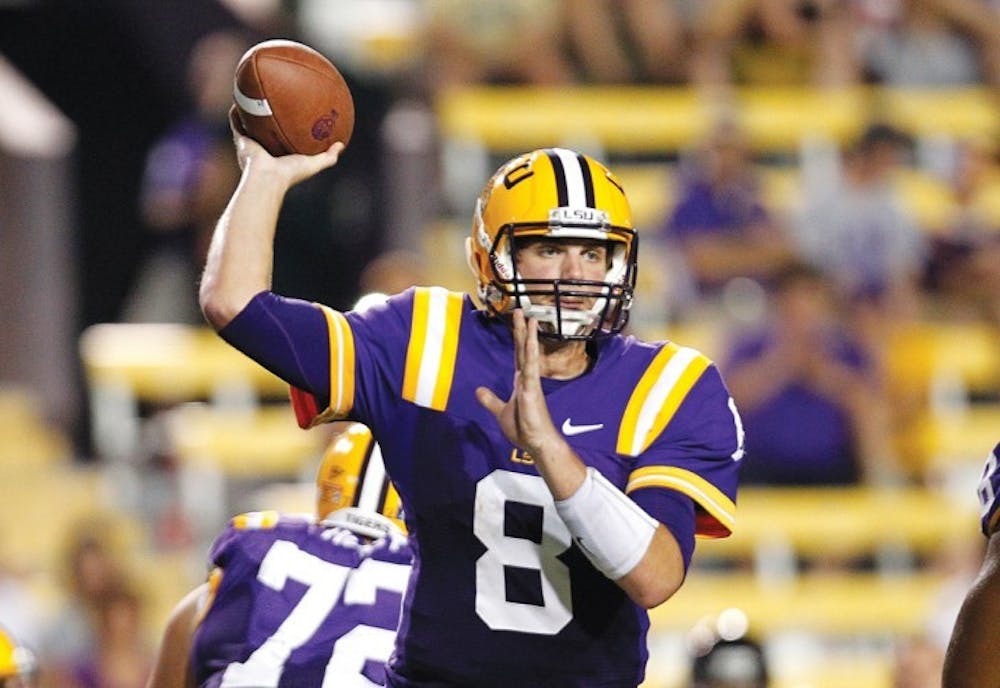 <p>LSU quarterback Zach Mettenberger (8) drops back to pass in the second half of their NCAA college football game against Idaho in Baton Rouge, La. Saturday, Sept. 15, 2012. LSU won 63-14.</p>