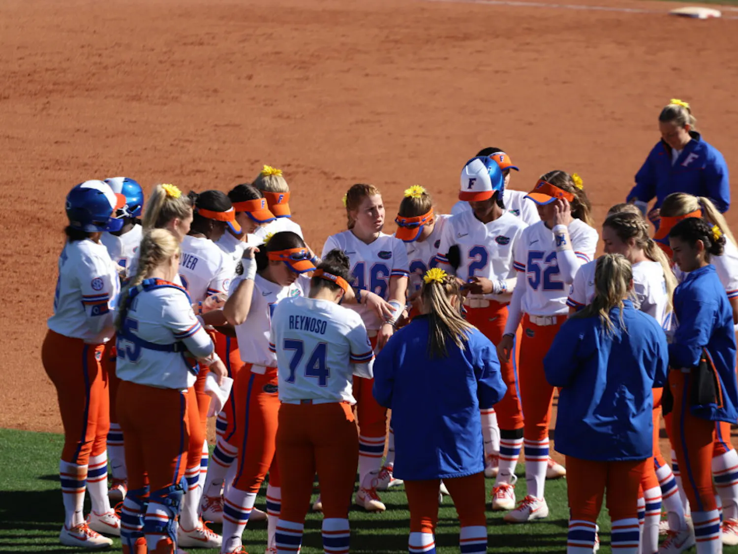 Florida softball team before its series against the Ragin' Cajun's this year. Lorenz will return to the program this year as a volunteer assistant coach. 