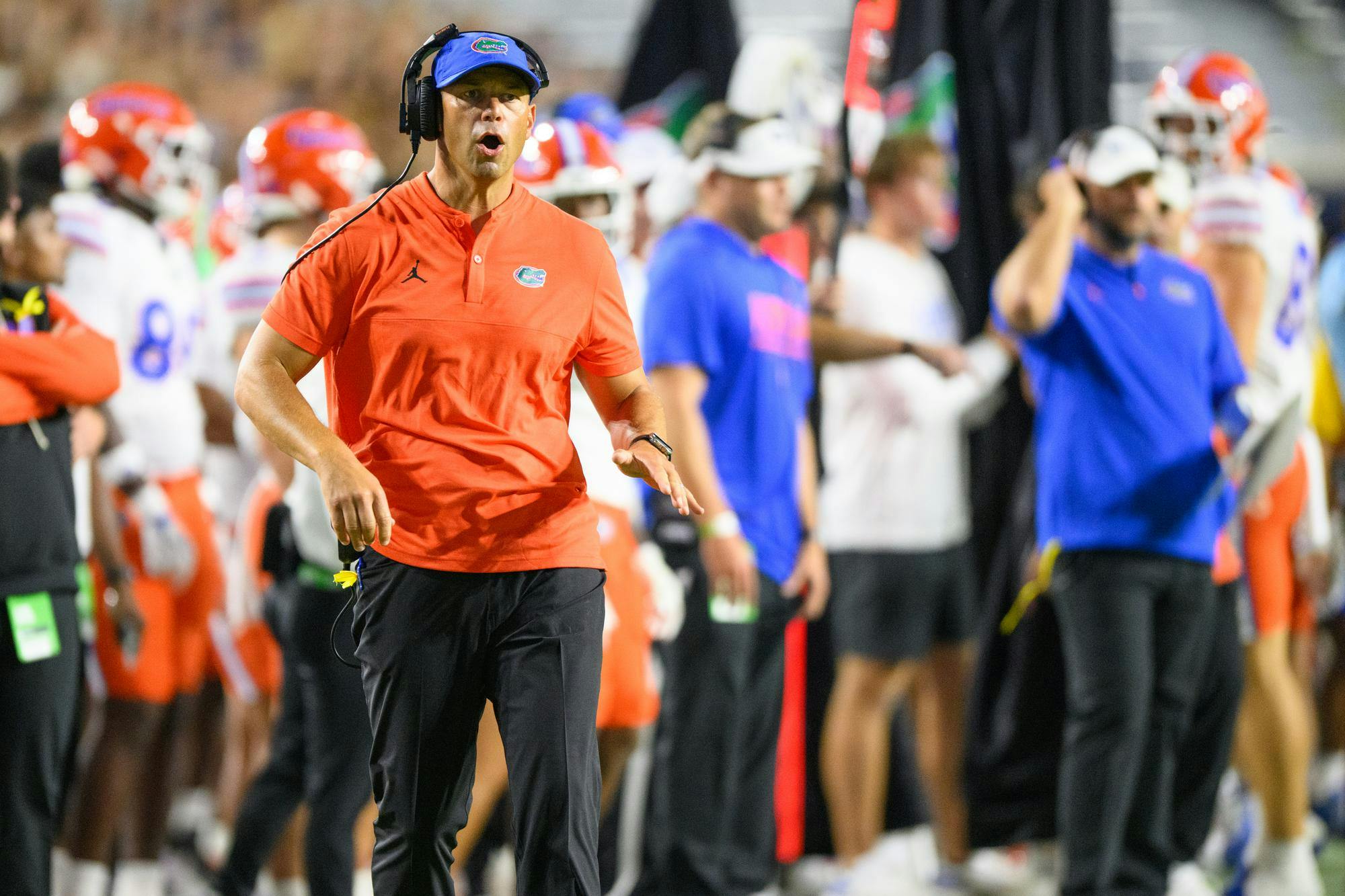 Florida head coach Jon Sumrall talks to a referee during the first half of an NCAA college football game against Auburn, Saturday, Sept. 19, 2026, in Auburn, Ala.