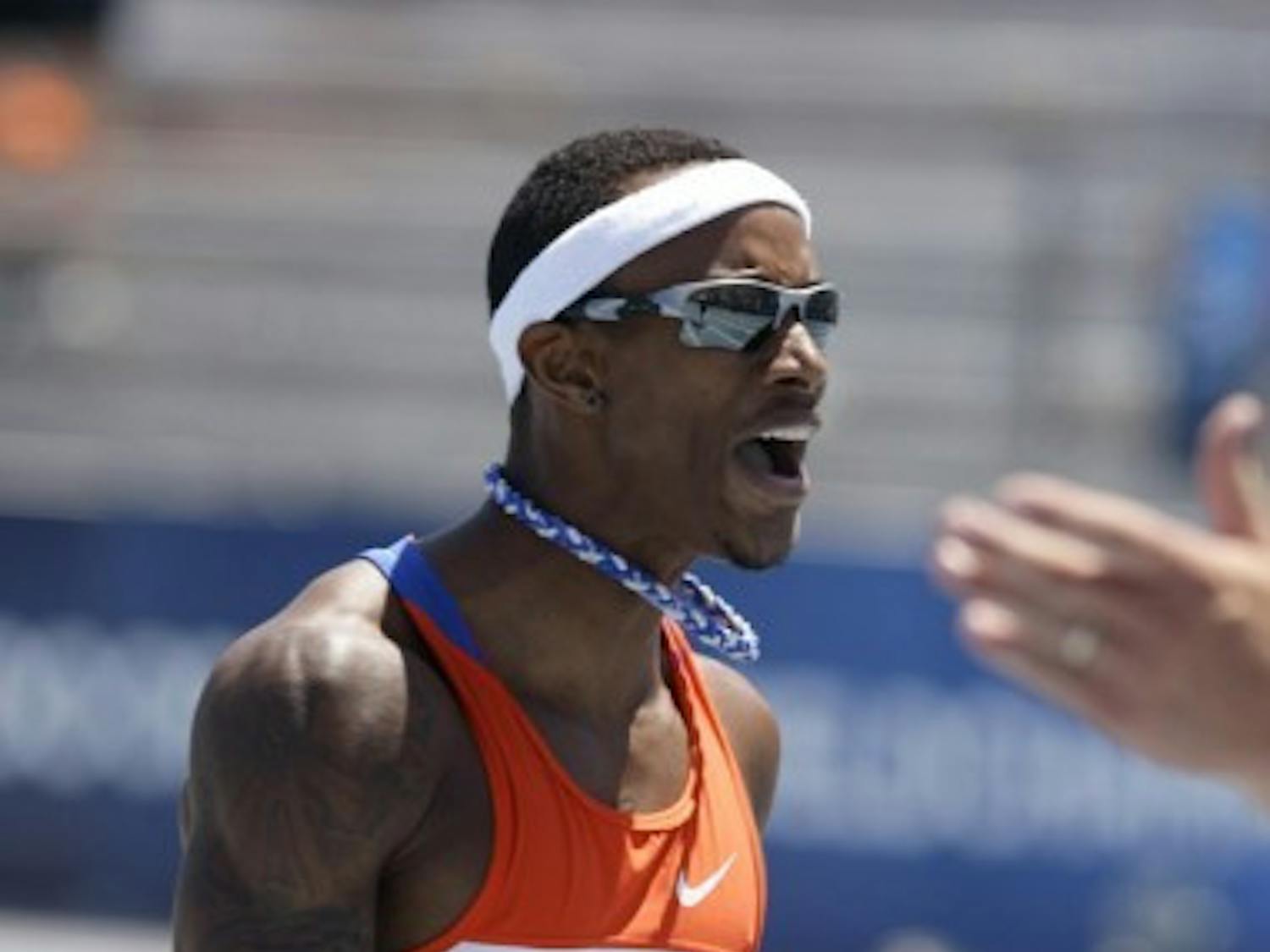 Florida’s Tony McQuay reacts after anchoring his team to victory in the men’s 4x400-meter relay at the NCAA outdoor track and field championships June 9 at Drake Stadium in Des Moines, Iowa.