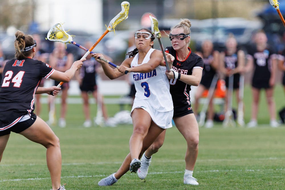 Florida attacker Autumn Blair (3) passes during the first quarter of an NCAA women’s lacrosse gmae against Mercer, Saturday, March 07, 2026, in Gainesville, Fla.