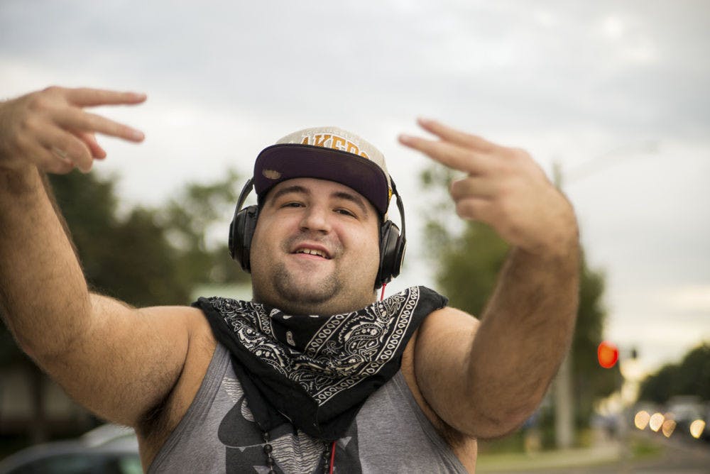 Rafael Torres, 23, raps and dances for passing motorists at the corner of Northwest 16th Avenue and Northwest 43rd Street in Gainesville. "When I feel out there I feel alive. I feel good," he said. "I feel like I’m in the studio, like I’m in a live out-there performance."