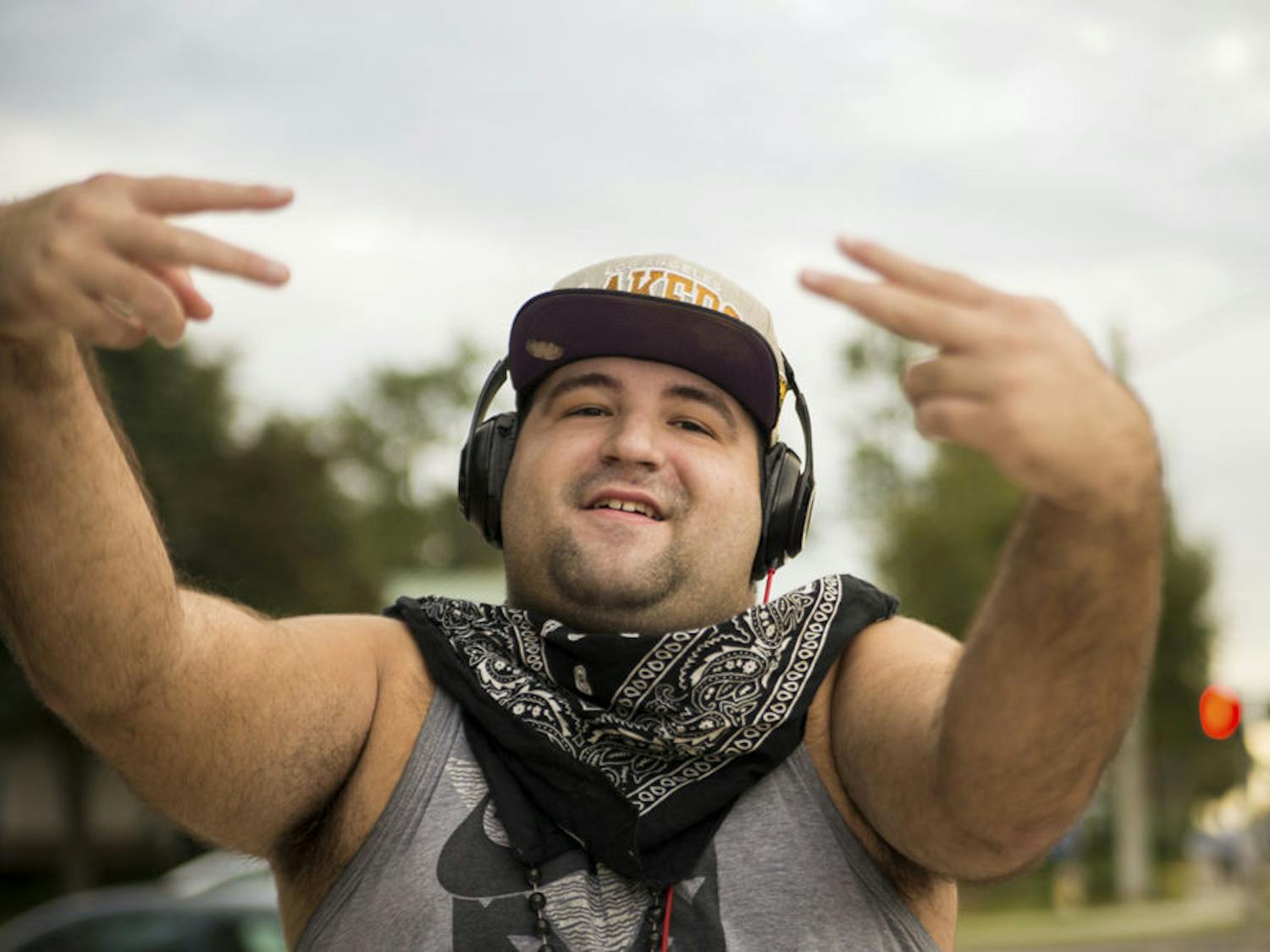 Rafael Torres, 23, raps and dances for passing motorists at the corner of Northwest 16th Avenue and Northwest 43rd Street in Gainesville. "When I feel out there I feel alive. I feel good," he said. "I feel like I’m in the studio, like I’m in a live out-there performance."
