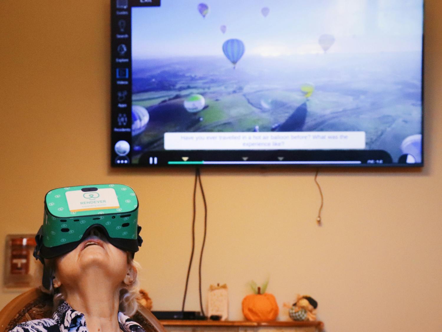 Kay Koons, 89, Oak Hammock resident, uses a Rendever virtual reality headset to take a hot-air balloon ride while at the Oak Hammock Health Pavilion on Wednesday, Oct. 20, 2021.