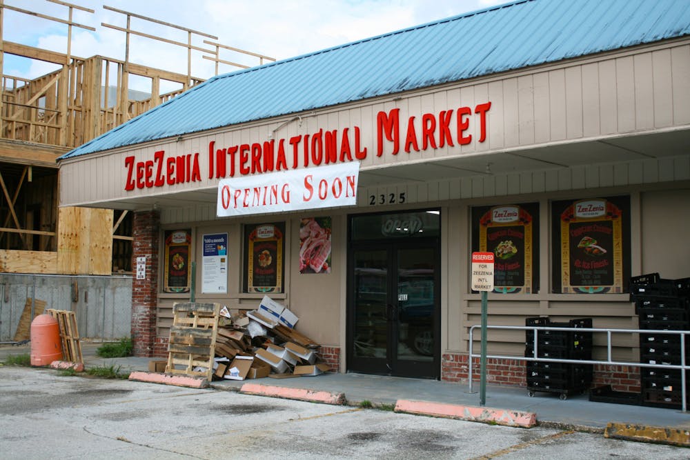 <p>ZeeZenia International Market under construction after a fire tarnished the inside Tuesday, Sept. 13, 2022. It is set to reopen on Friday, Sept. 23, 2022.</p>