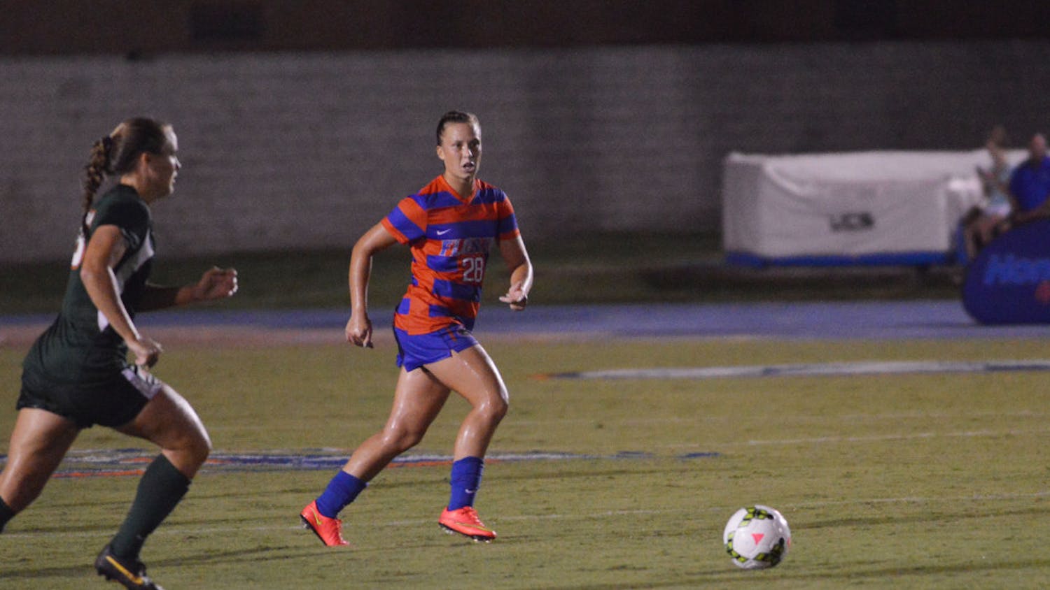Sophomore midfielder Meggie Dougherty Howard runs toward the ball during Florida's 3-0 win against Miami on August 22, 2014, at James G. Pressly Stadium.