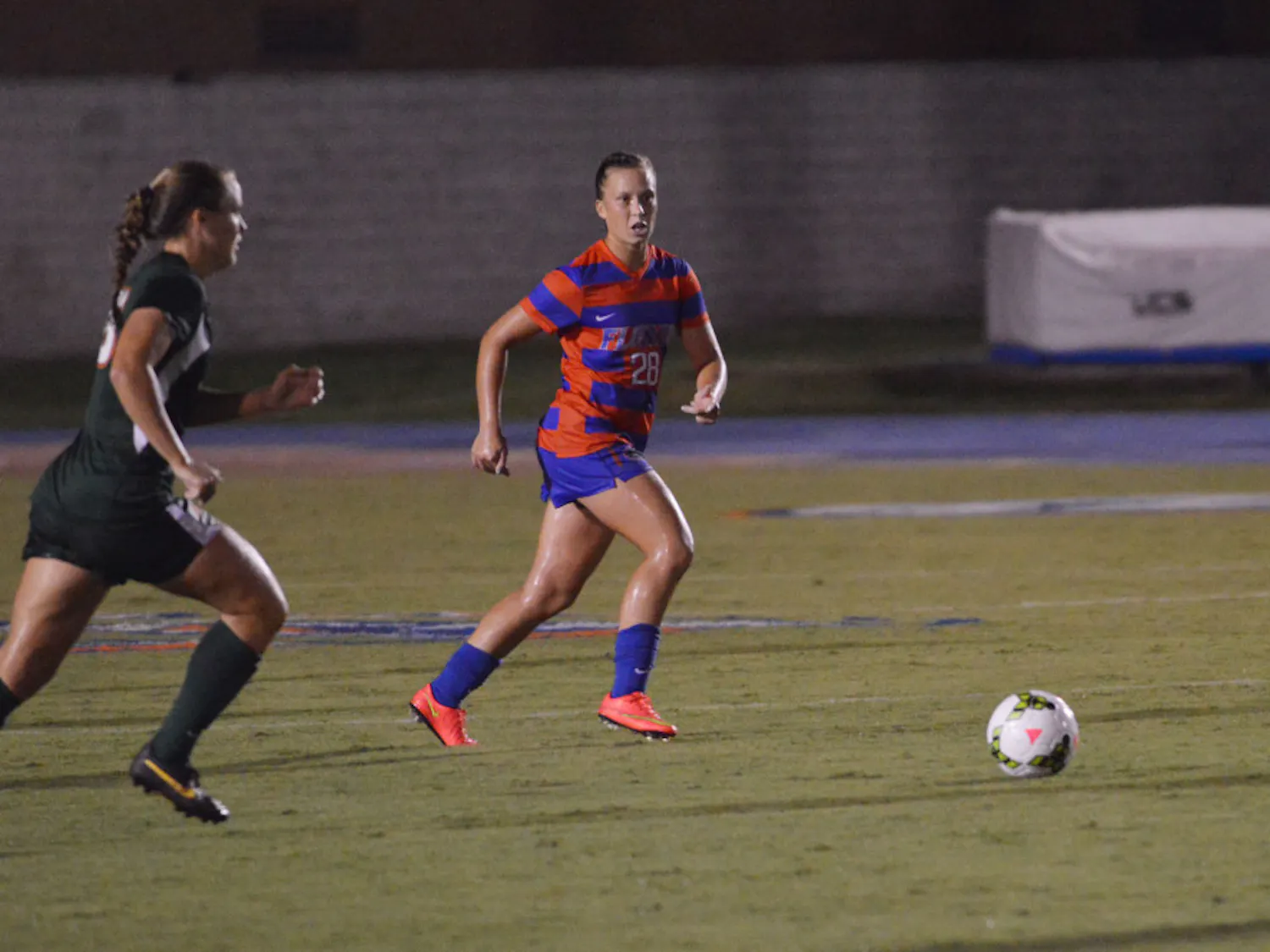 Sophomore midfielder Meggie Dougherty Howard runs toward the ball during Florida's 3-0 win against Miami on August 22, 2014, at James G. Pressly Stadium.