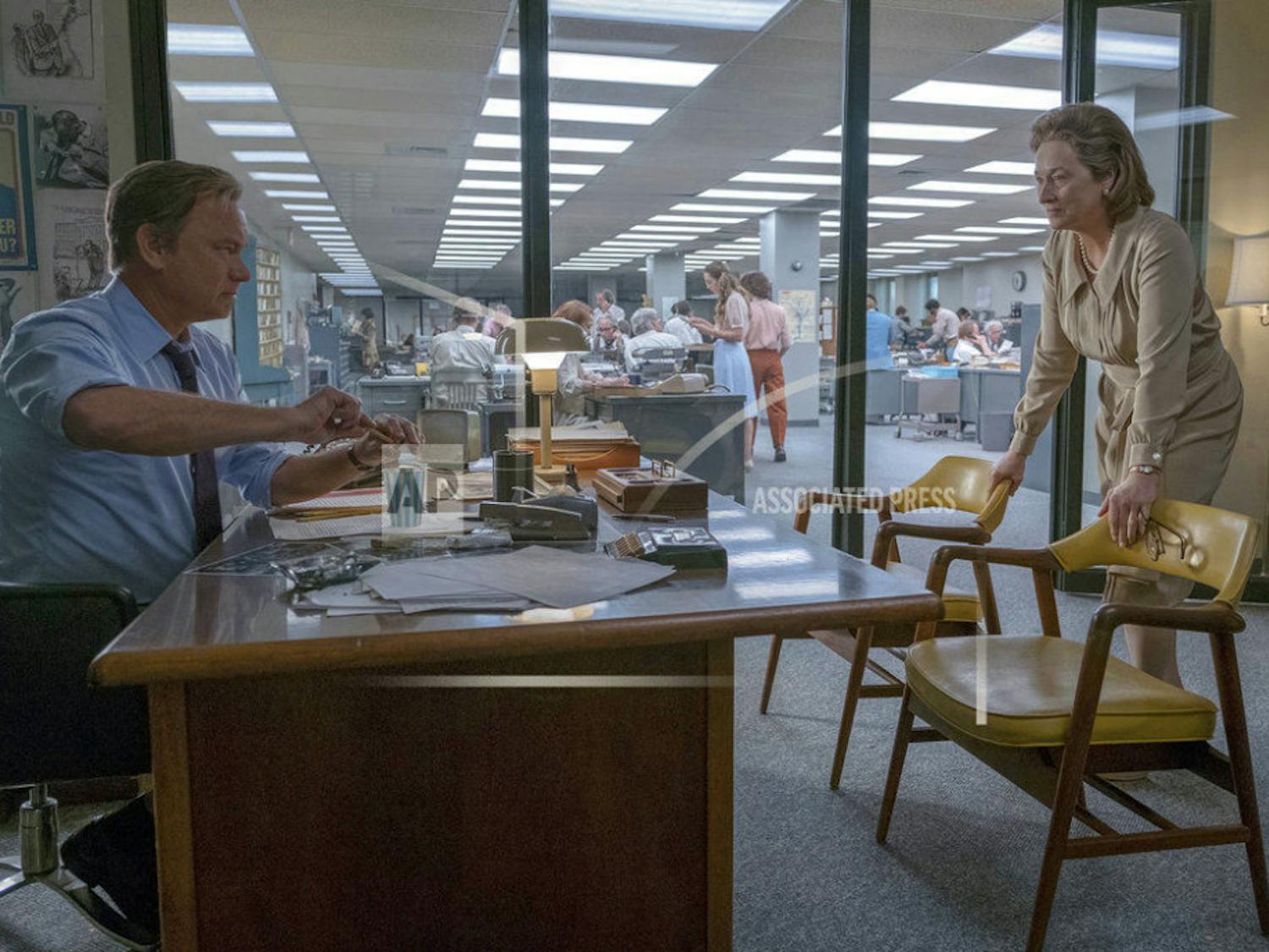 In this image released by 20th Century Fox, Tom Hanks portrays Ben Bradlee, left, and Meryl Streep portrays Katharine Graham in a scene from "The Post." (Niko Tavernise/20th Century Fox via AP)