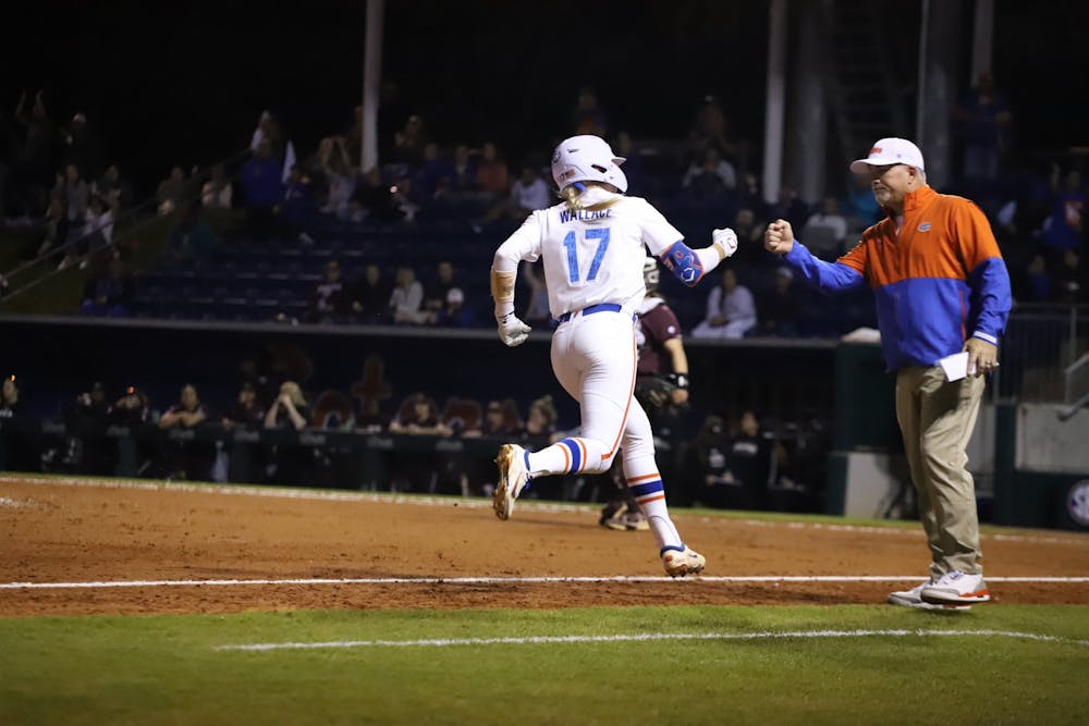 <p>Redshirt junior Skylar Wallace rounds third after launching a home run to center field. Florida takes on conference rival Tennessee in a weekend series.</p>