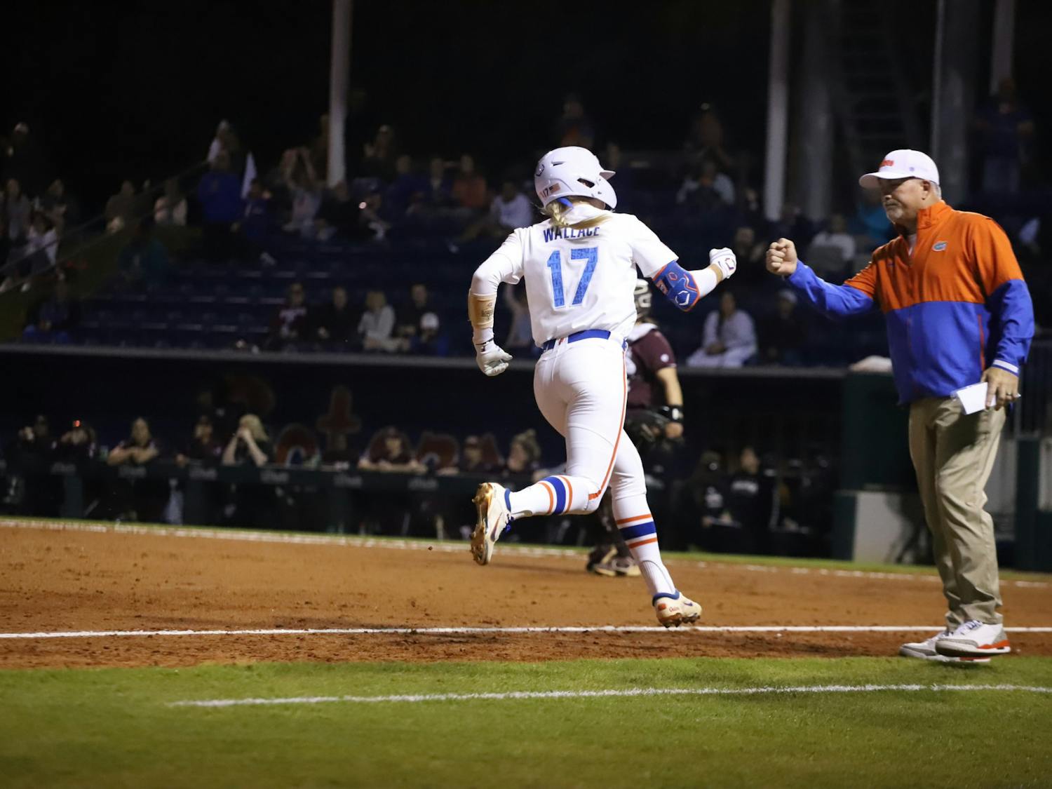 Redshirt junior Skylar Wallace rounds third after launching a home run to center field. Florida takes on conference rival Tennessee in a weekend series.