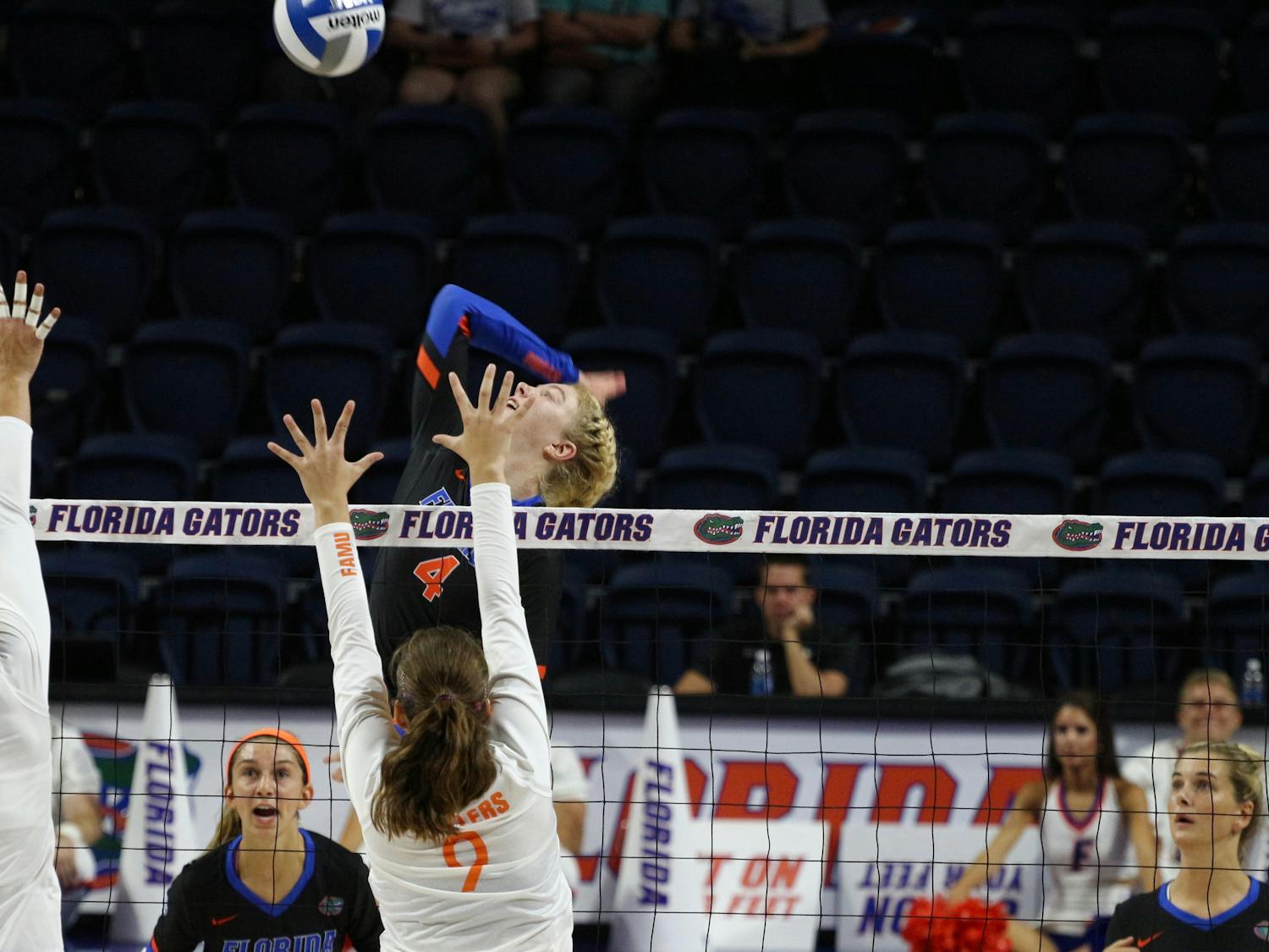 Carli Snyder gets ready to spike the ball over the net during UF's 3-1 win against Florida A&amp;M on Friday at the O'Connell Center. 