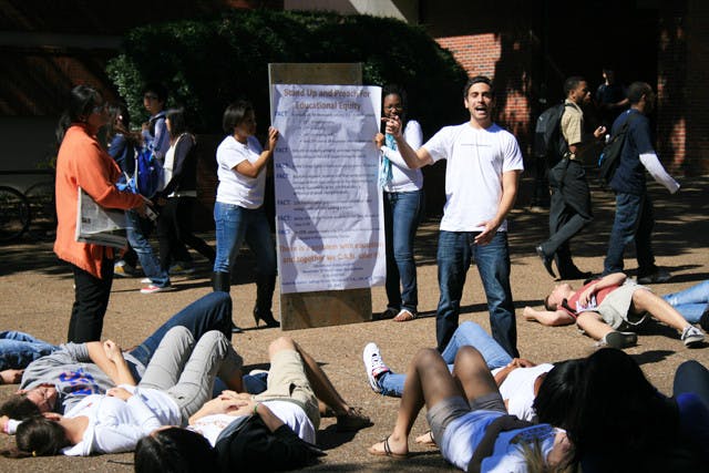 About 15 students drop down onto the pavement in the middle of Turlington Plaza on Tuesday afternoon, representing the students who drop out of high school every 26 seconds in the U.S. Read the story at alligator.org.